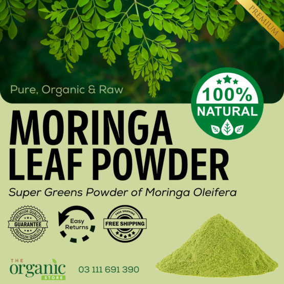 Moringa powder on the spoon. by Organic Honey Pakistan